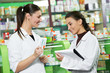Pharmacy chemist women in drugstore Pharmacy chemist women in drugstore