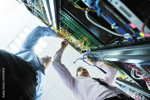 Photo: it engineers in network server room it engineers in network server room