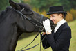 horsewoman jockey in uniform with horse horsewoman jockey in uniform with horse