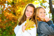 Beautiful Teenage Girls Having Fun in Autumn Park. Outdoor Beautiful Teenage Girls Having Fun in Autumn Park. Outdoor