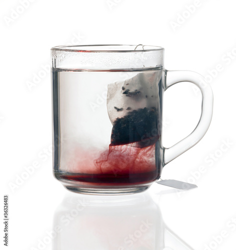 Photo: glass teacup with tea bag glass teacup with tea bag