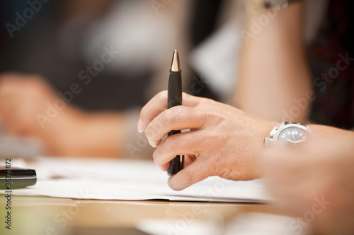 Photo: Hand with a pen Hand with a pen