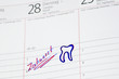 Zahnarzt termin im Kalender notiert