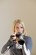 Frau mit DSLR Frau mit DSLR