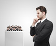 Businessman look at the group of businessmen
