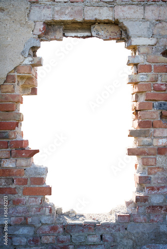 Photo: Hole in the brick wall with copy space Hole in the brick wall with copy space