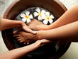 Woman getting relaxing pedicure at spa