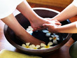 Female getting pedicure treatment at spa