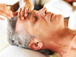 Mature man having massage in spa salon