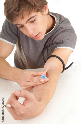 Photo: smoking drug addict young man in action smoking drug addict young man in action