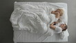 Young couple sleeping and turning in bed at night