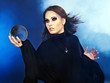 Young woman with crystal ball.