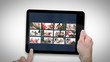 tablet displaying videos about family celebrating