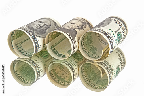 Photo: dollars banknotes rolls dollars banknotes rolls
