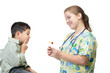 Nurse gives boy a choice of candy.