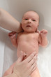 newborn baby in bathtub