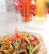 original fajita sizzling hot  on iron plate