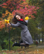Girl in park colourful autumn