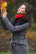Girl in park colourful autumn