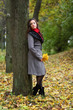 Girl in park colourful autumn