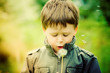 Photo: Child Blowing Dandelion Child Blowing Dandelion