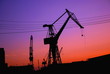 Photo: Silhouette of cranes in harbor Silhouette of cranes in harbor