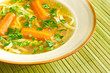 Fresh broth with carrot and parsley