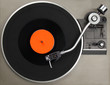 Record player with vinyl record