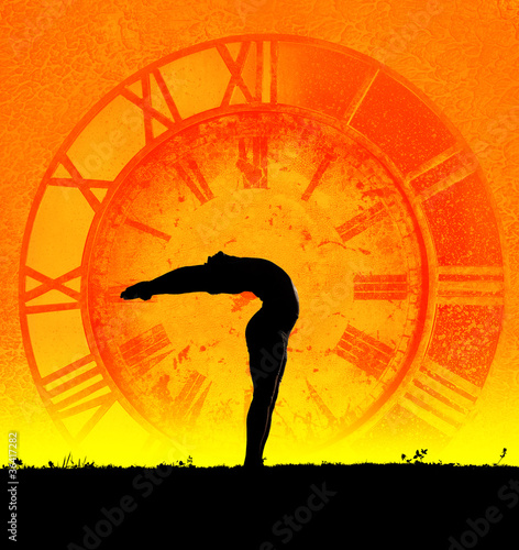 Photo: Concept of yoga and time Concept of yoga and time