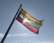 Lithuanian tricolor flag flies and the waves. Lithuanian tricolor flag flies and the waves.