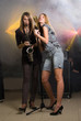 Two beautiful musical women on stage