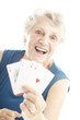 senior woman playing poker senior woman playing poker