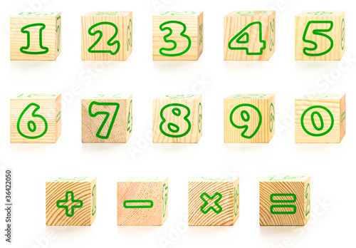 Photo: The Numbers wooden cubes isolated on white. The Numbers wooden cubes isolated on white.