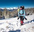 Hiker in winter mountains