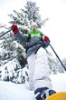 Hiker walks in snow forest
