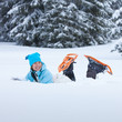 Hiker lying in snow
