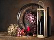 still life with red wine in box