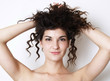 Photo: Beautiful yung woman touches her hair Beautiful yung woman touches her hair