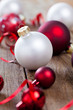 christmas baubles on weathered wood