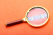 Unemployment concept with magnifying glass