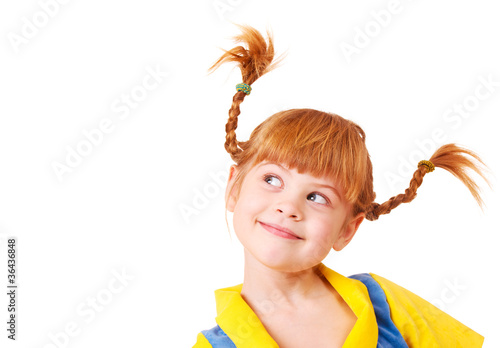 Photo: Little girl with red braided hair Little girl with red braided hair