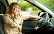 calling young beautiful woman driving her new car