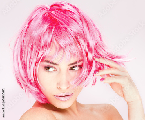 Photo: Portrait of a pretty young pink hair woman Portrait of a pretty young pink hair woman