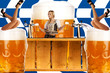 crazy oktoberfest style with sexy tiroler girl serving beer