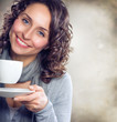 Beautiful Woman with cup of Tea or Coffee