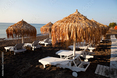 Photo: Sunbeds in Perissa, Santorini, Greece Sunbeds in Perissa, Santorini, Greece