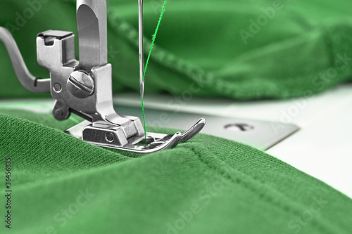 Photo: Sewing machine and item of clothing, detail Sewing machine and item of clothing, detail
