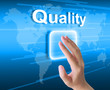 hand pressing quality button on a touch screen interface
