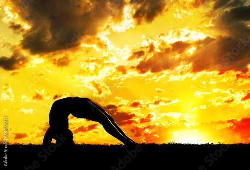 Photo: Yoga silhouette at sunset Yoga silhouette at sunset
