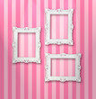 Set of white ornamental frames on a stripy wallpaper Set of white ornamental frames on a stripy wallpaper